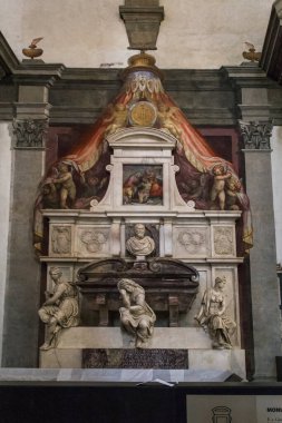 FLORENCE, ITALY - SEPTEMBER 18, 2018: This is the monument and grave of Michelangelo in the basilica di Santa Croce.