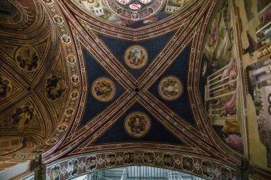 FLORENCE, ITALY - SEPTEMBER 18, 2018: This is a fragment of the vaults of the Baroncelli Chapel, a masterpiece of the Renaissance in the interior of the Basilica di Santa Croce.