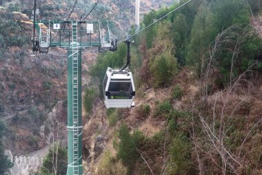 FUNCHAL, PORTUGAL - AUGUST 24, 2021: This is the cable car from the Monte district to the Botanical Garden on a rainy summer day.