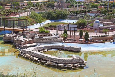 LATRUN, ISRSAEL - SEPTEMBER 18, 2017: This is the model of the historic buildings and harbor of Acre in the Mini Israel miniature park..