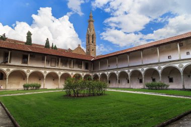 FLORENCE, ITALY - SEPTEMBER 18, 2018: This is the second cloister of the Franciscan monastery adjacent to the Basilica of Santa Croce.