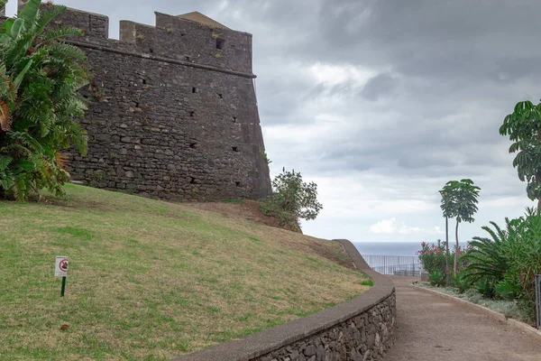 FUNCHAL, MADEIRA - AUGUST 25, 2021: This is a park alley near the walls of the fortress of San Juan Baptista do Pico.