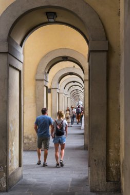 FLORENCE, ITALY - SEPTEMBER 13, 2018: This is a gallery under the Vasari Corridor along the embankment along the Arno River.
