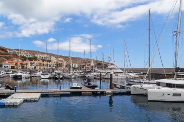 QUINTA DO LORDE, PORTUGAL - AUGUST 28, 2021: This is a marina with moorings for yachts and boats in a small modern resort village in the east of Madeira.