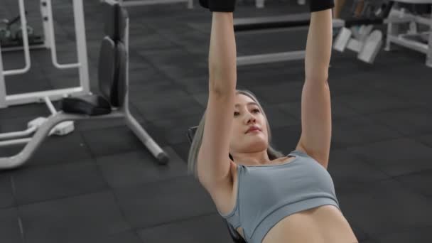 Young Attractive Athletic Asian Woman Training Her Arms Upper Body — Stockvideo