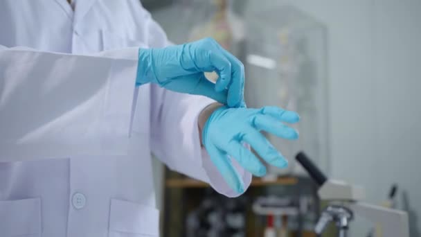 Close Female Scientist Lab Researcher White Lab Coat Putting Blue — Video