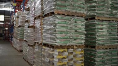 Chiang Mai, Thailand - 7 August 2022 -  Stock piles of home improvement products on industrial shelves in a warehouse storage