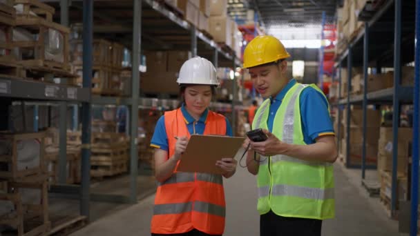 Two Happy Male Female Warehouse Staff Wearing Safety Vest Hardhat — Stockvideo