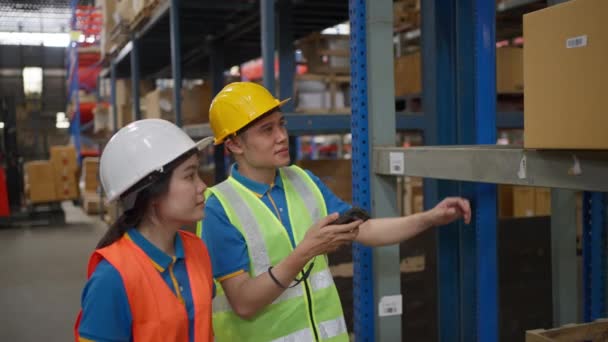 Male Female Warehouse Staff Working Together Check Inventory Scanning Barcode — 비디오