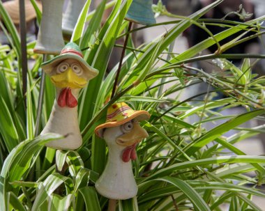 Magdeburg, Pottery market - 06 August 2022: Geese in hats. Individual utility ceramics, fun pottery, fine jewelry to artistic objects