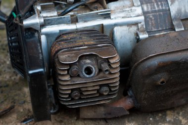Close up shot a small electricity generator in an engineering workshop, undergoing repair and maintenance for better generation of electrical energy for household and business in Nigeria
