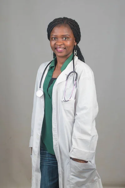 A lady or female medical practitioner from Nigeria with a stethoscope around her neck representing medical practitioners like doctors, nurses, surgeon, physician,dentist among others