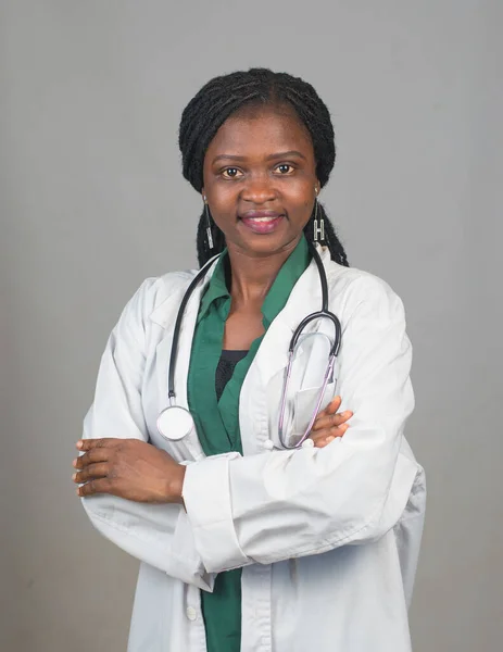 A lady or female medical practitioner from Nigeria with a stethoscope around her neck representing medical practitioners like doctors, nurses, surgeon, physician,dentist among others