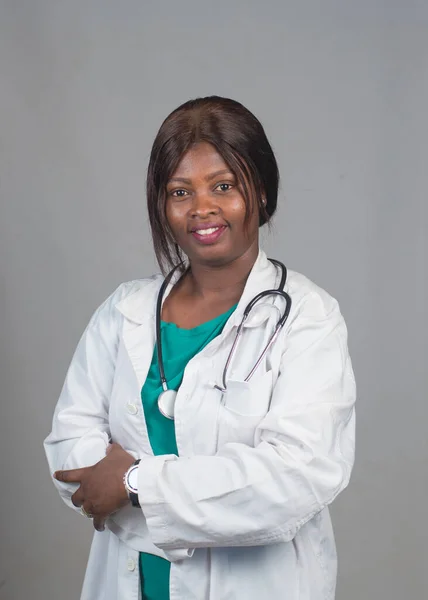 A lady or female medical practitioner from Nigeria with a stethoscope around her neck representing medical practitioners like doctors, nurses, surgeon, physician,dentist among others