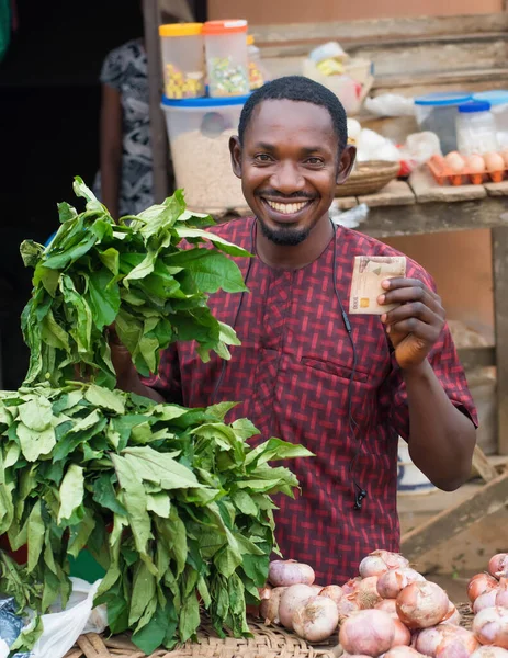 Nigerian Male Sales Person Trader Businessman Shop Owner Entrepreneur Holding — Fotografie, imagine de stoc