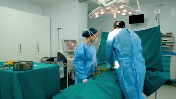 Surgeon Surgical Team Performing Cosmetic Surgery Breasts Hospital Operating Room — Stock Video