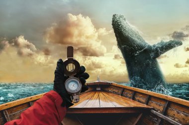 Kambur balinanın bir teknenin önünde sudan atladığı destansı bir sahne. Denizci elinde bir pusula tutuyor. Macera yolculuğu konsepti.