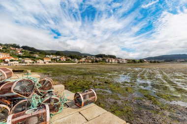 Fishing village of Combarro. Tourism in Galicia. The most beautiful spots in Spain. clipart