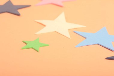 stars of star on a yellow background.