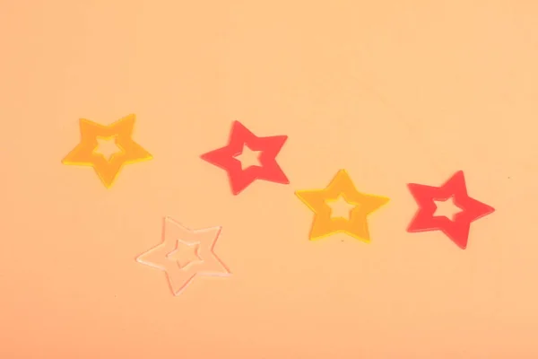 Star Stars Yellow Background Top View Copy Space —  Fotos de Stock
