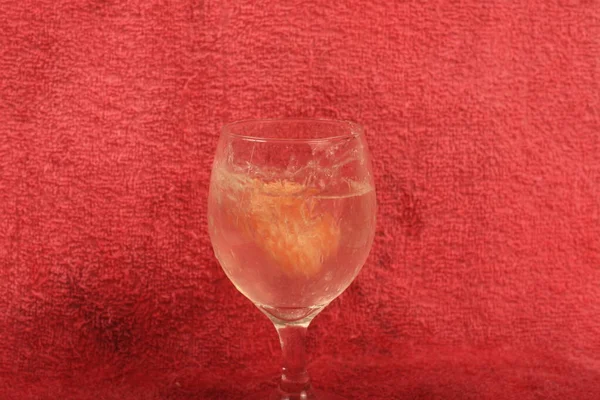 glass of red wine on a white background