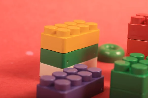 plastic toy blocks on a white background