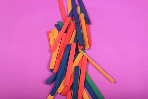 Colorful Popsicle Sticks Purple Background — Stock Photo, Image