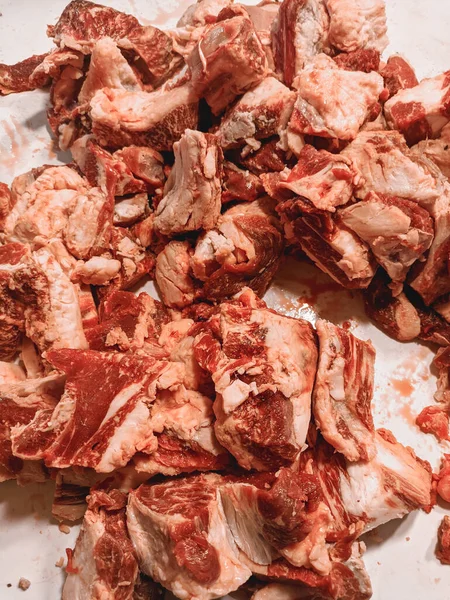 fresh cuts of raw beef sold in shops or in markets