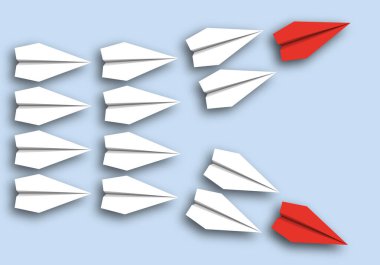 Concept of divergence of opinion with 2 columns of origami airplanes separating in two directions.