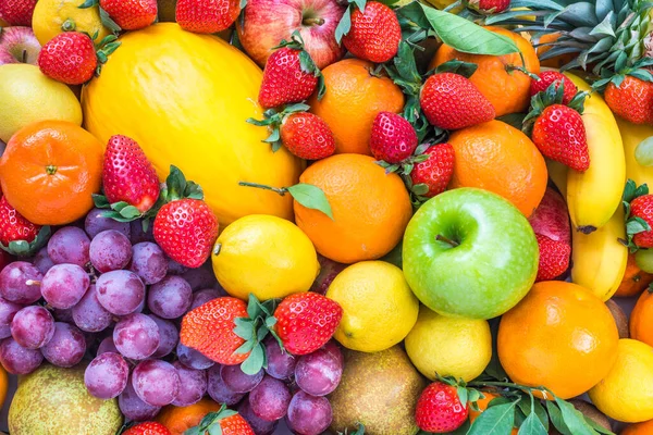 Fresh fruits colorful background. Healthy natural vitamins nutrition.