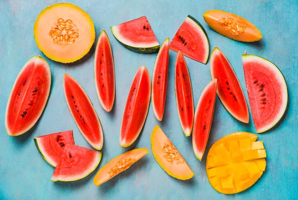 Summer fruits vibrant colors watermelon and melon colors fruit background.