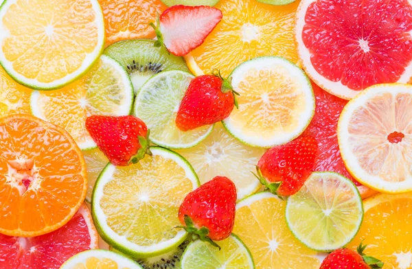 Fruits variety background.Slices of lemon, orange, mandarin, lime, grapefruit background, vitamin C fruits concept.