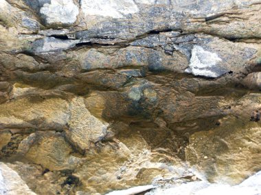 Doğal taşlı eski taş duvarın dokusu.