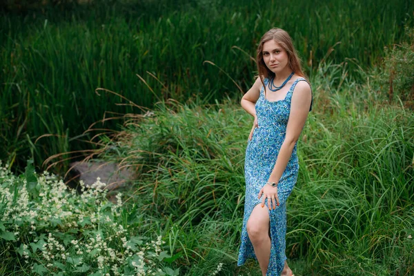 Slender Young Girl Blond Hair Blue Summer Dress Stands Green — Photo