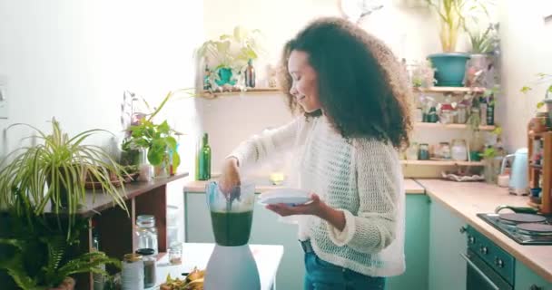 Young African Girl Tasting Her Smoothie — Stockvideo