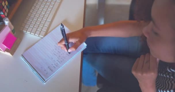 Cropped Shot Attractive Young African Woman Sitting Alone Making Note — Wideo stockowe