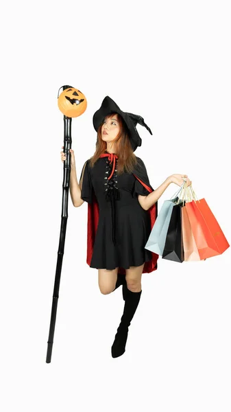 Beautiful Girl Black Dress Witch Hat Holding Shopping Bags Looking — Stock Fotó