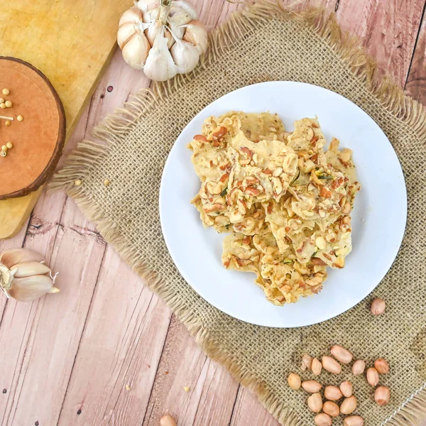 rempeyek kacang or peyek kacang is one of type traditional snack from java