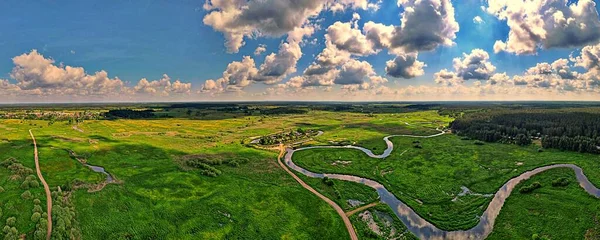 Panorama from the drone to the hermitage of orthodox monks.Orthodox building-Skit located in the valley of the Narew River surrounded by a moat.