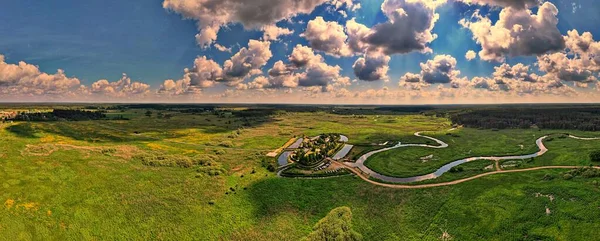 Panorama from the drone to the hermitage of orthodox monks.Orthodox building-Skit located in the valley of the Narew River surrounded by a moat.
