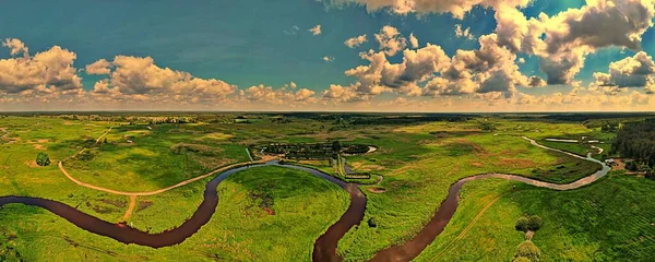 Panorama from the drone to the hermitage of orthodox monks.Orthodox building-Skit located in the valley of the Narew River surrounded by a moat.