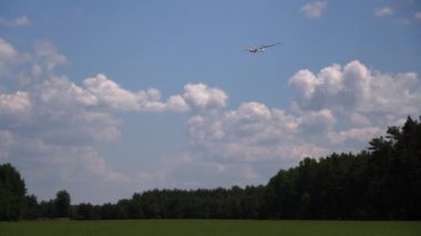 Landing of a glider ,among fields and meadows in Podlasie.