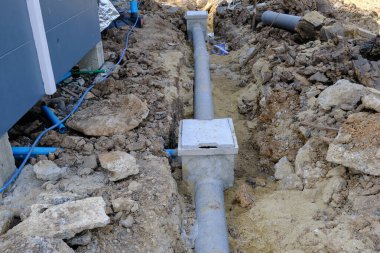 laying and installation of sewage pipes and drain pipes from factories, houses. focus on concrete.  