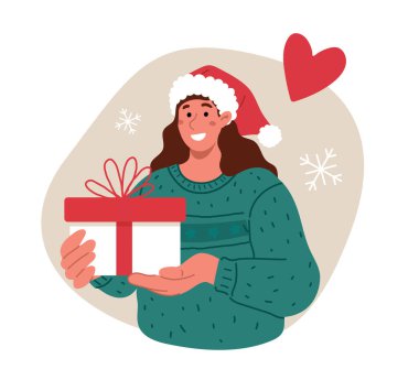 Gülümseyen kadın Noel için hediye paketliyor, yeni yıl kutlaması.