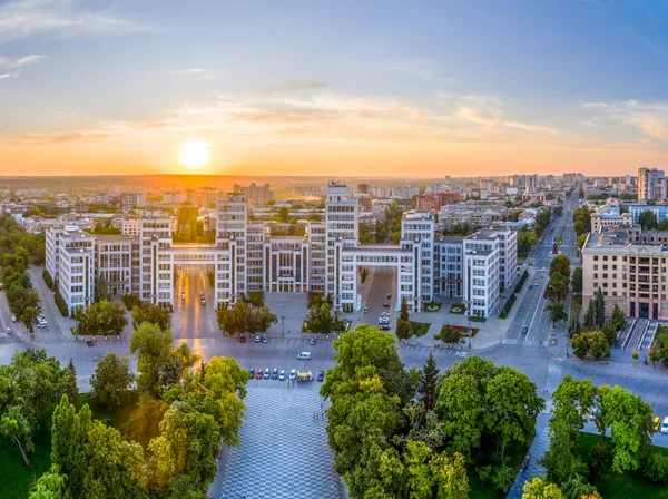 Monumental building of administrative institutions and enterprises - GOSPROM (DERZHPROM) Sunset. Panoramic view of the city from a drone.