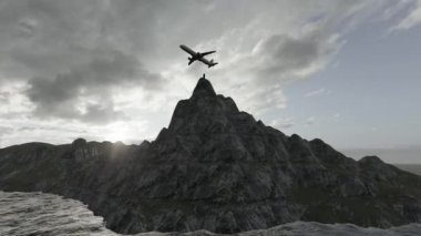 The plane flew over the top of the mountain