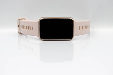 Women's smart watch with on a white background. Closeup smart watch