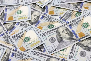 Yüz dolarlık banknotların dokusu. arka plan 100 dolarlık faturalar.