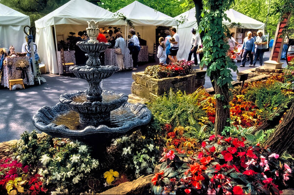 Branson, Missouri USA April 19, 1992: A spring flower festival draws crowds to look and shop at Silver Dollar City.