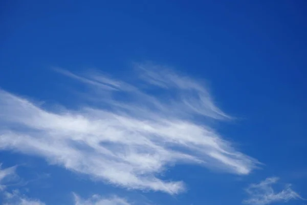 Sunny weather on blue sky and white cloud background